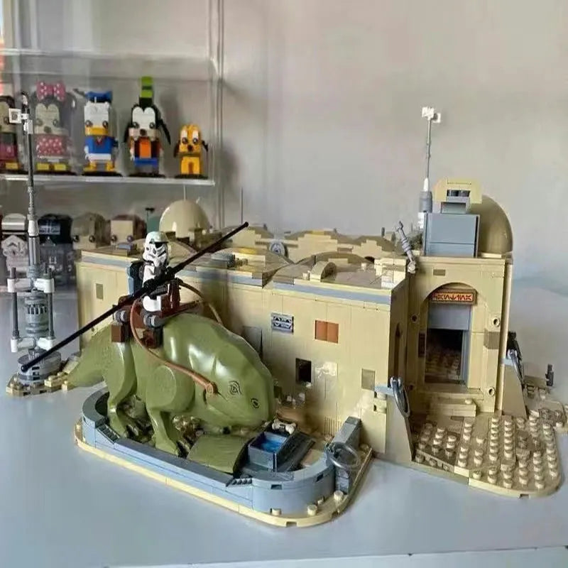 LEGO Star Wars Mos Eisley Cantina playset with green creature and Stormtrooper figure