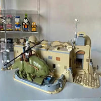 Thumbnail for LEGO Star Wars Mos Eisley Cantina playset with green creature and Stormtrooper figure