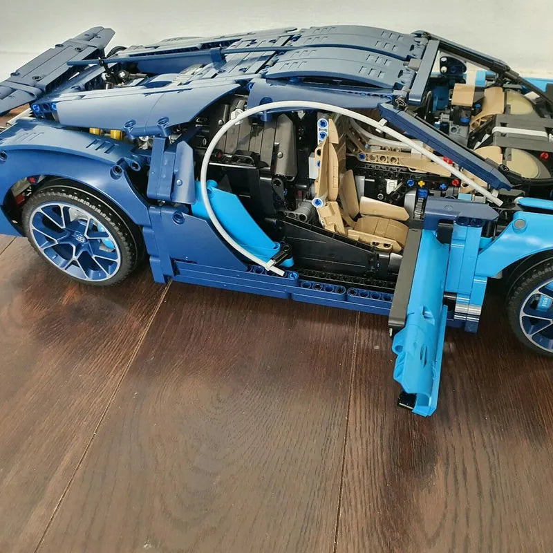 LEGO Technic model of a blue Bugatti Chiron Racing Car, showcasing internal components