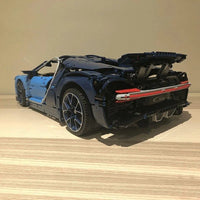 Thumbnail for Model Bugatti Chiron Racing Car in blue and black with a prominent rear spoiler
