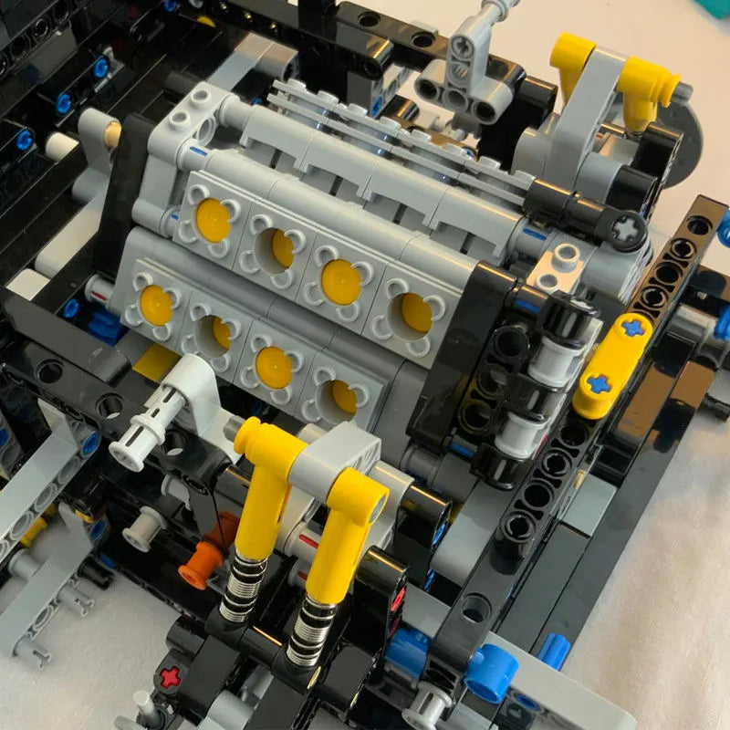 LEGO Technic engine assembly with yellow and black components for Bugatti Chiron Racing Car